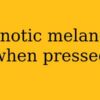 Does amelanotic melanoma blanch when pressed