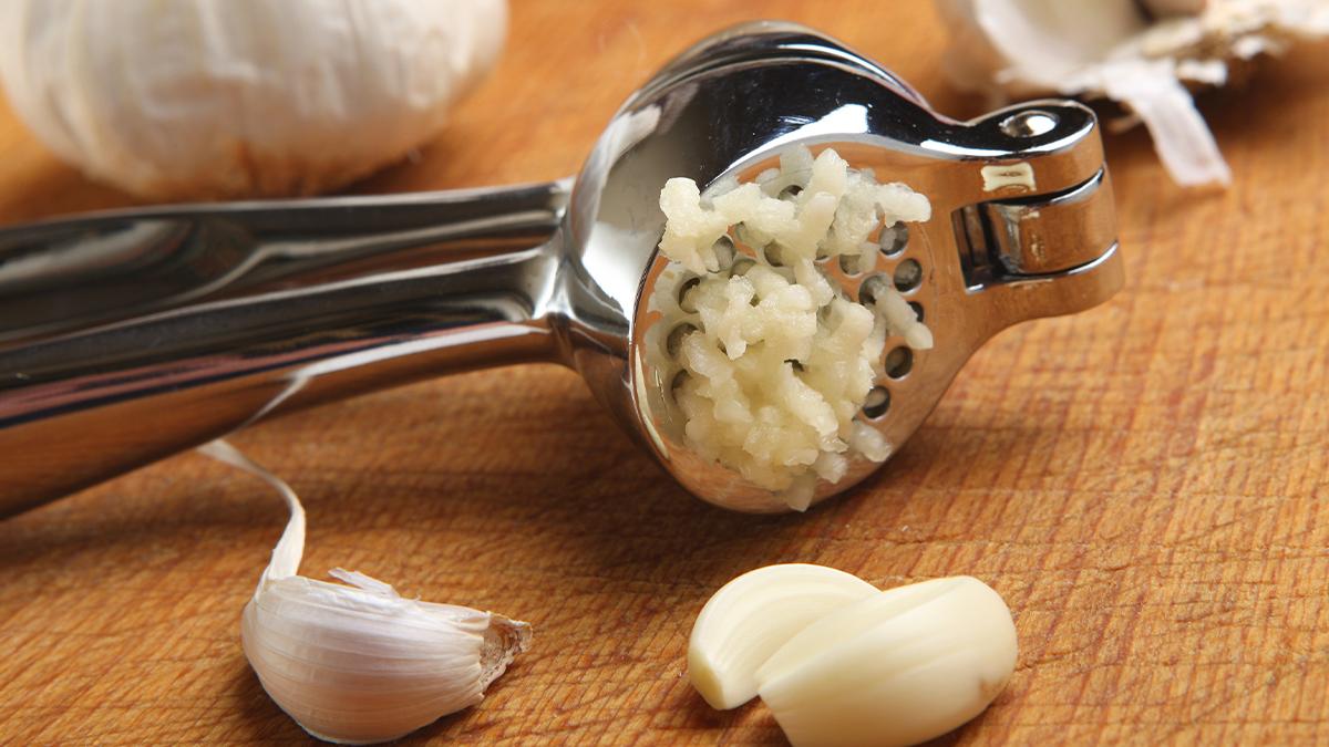 Clean Your Garlic Press in Seconds (Even the Stuck Bits) With Cooking Spray