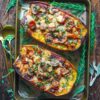 Italian Sausage Stuffed Spaghetti Squash with Spinach, Tomatoes, and Mushrooms