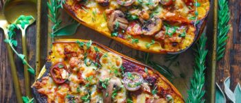 Italian Sausage Stuffed Spaghetti Squash with Spinach, Tomatoes, and Mushrooms